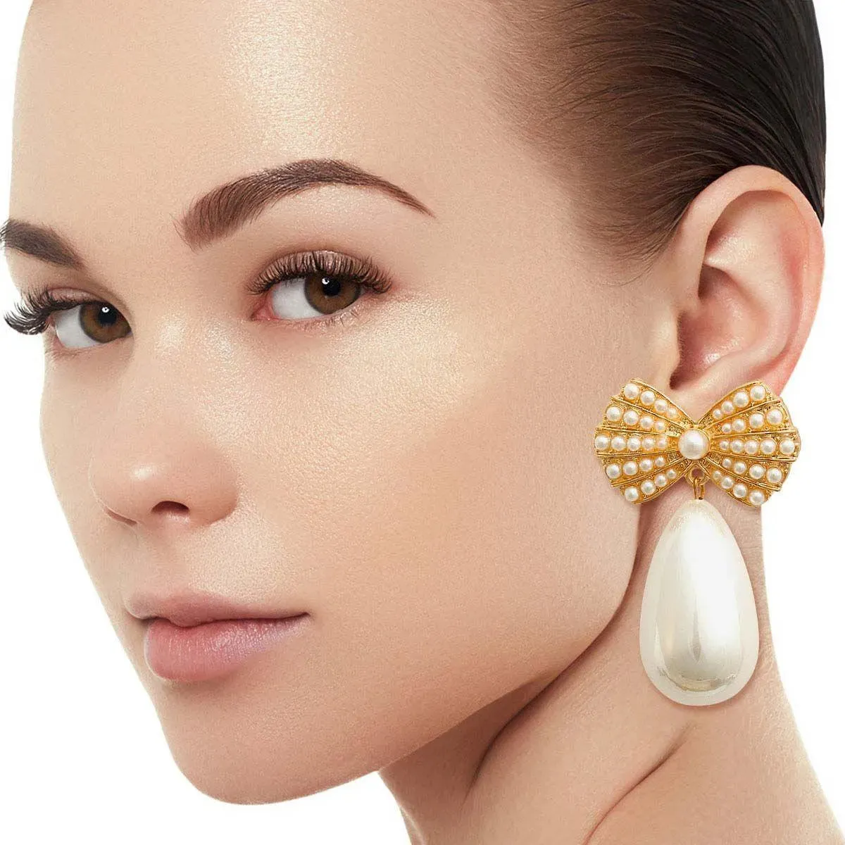 Elegant Gold Tone & Faux Cream Pearl Bow Earrings with Teardrop Detail