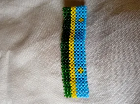 Rwanda flag beaded bracelet handmade from Kenya by the masaai/maasai community